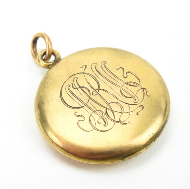 Antique 19th C Gold Monogram Locket Pendant: Antique 19th C Gold Monogram Locket Pendant. Circa 1895-1905 with Art Nouveau style calligraphy monogram. Gold filled round locket necklace pendant with monogram. Measures just over 1.25 inches in len