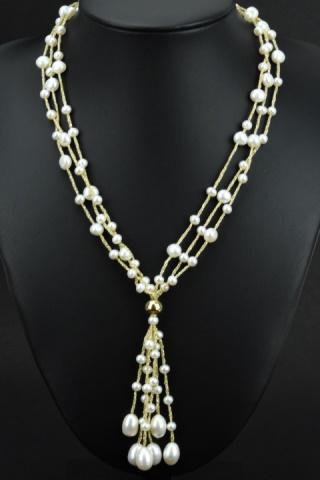 Estate 14k Yellow Gold Clasp Pearl Necklace: Estate 14k Yellow Gold Clasp Pearl Necklace w Tassel Pendant. Clasp and pendant at tassel are 14kt yellow gold. Measures 17 inches plus the tassel.