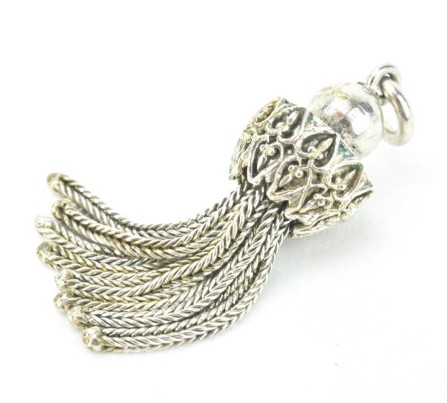 Antique Sterling Silver Tassel Necklace Pendant: Antique Sterling Silver Tassel Necklace Pendant. Measures nearly 1.5 inches in length.