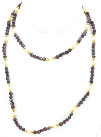 Antique Hand Faceted Spinel Baroque Pearl Necklace: Antique Hand Faceted Spinel Baroque Pearl Necklace. Opera length necklace featuring filigree navette form clasp with hand faceted red spinel beads and baroque pearls. Measures 35 inches in length.