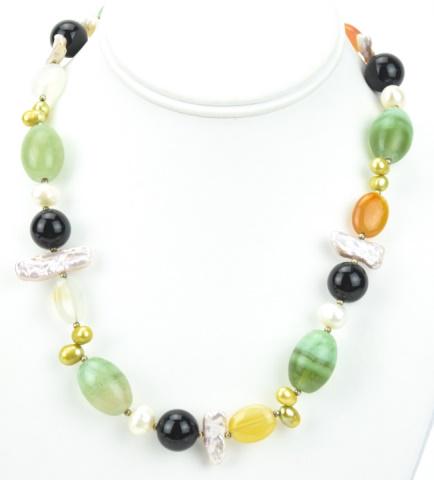 Baroque Pearl, Agate & Carnelian Necklace Strand: Baroque Pearl, Agate & Carnelian Necklace Strand. Featuring high luster baroque pearls in varying sizes as well as banded agate and carnelian beads. Measures 19 inches in length.