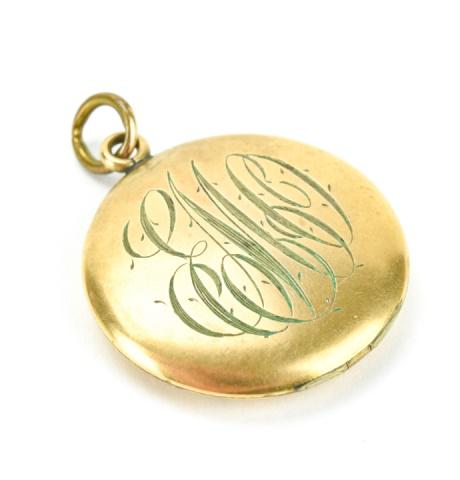 Antique 19th C Gold Filled Monogram Locket Necklace: Antique 19th C Gold Filled Monogram Locket Necklace Pendant. One side plain, one side with three letter monogram. Measures 1.5 inches in length.