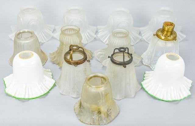 Lot Assorted Tulip Form Molded Glass Shades. 13 shades: Lot Assorted Tulip Form Molded Glass Shades. 13 shades total. In varying styles and sizes. Largest measures 4.5 inches high x 6.5 inches in diameter.