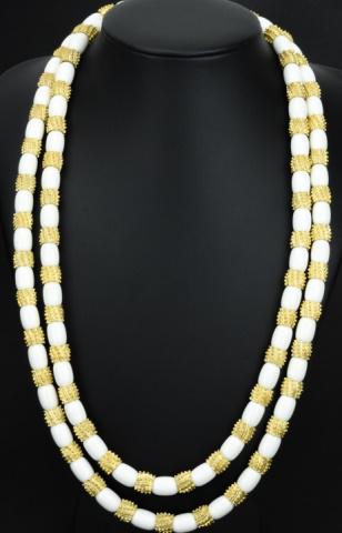 Vintage Crown Trifari Gilt Metal Beaded Necklace: Vintage Crown Trifari Double Strand Gilt Metal Beaded Necklace. With original tag. Necklace marked on back of clasp. Measures 22 inches in length.