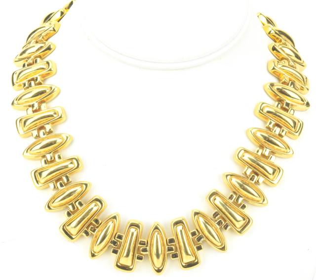 Vintage Monet Modernist Gold Tone Collar Necklace: Vintage Monet Modernist Gold Tone Collar Necklace. Marked on clasp. Necklace measures 18 inches in length.