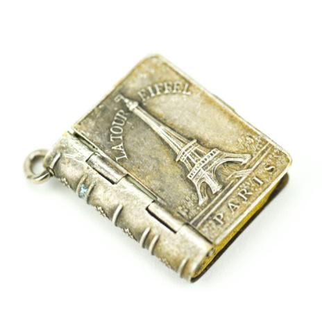 Antique Paris France Locket Pendant w Eiffel Tower: Antique Paris France Locket Necklace Pendant w Eiffel Tower. Interior with accordion of Paris, France photographs. Measures just over 1 inch in length.