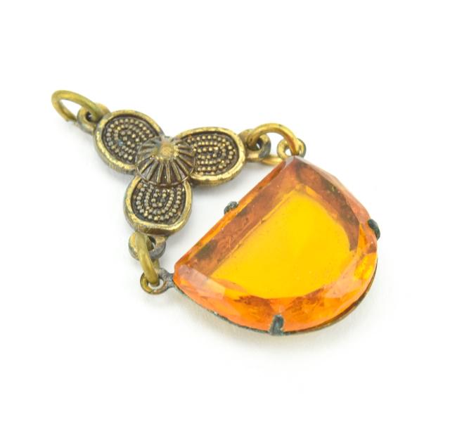 Antique Art Deco Citrine Crystal Necklace Pendant: Antique Art Deco Citrine Crystal Necklace Pendant. Gilt metal and floral motif. Measures just over 1 inch in length.