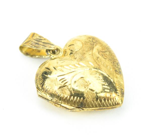Vintage Gold Over Sterling Silver Heart Locket: Vintage Gold Over Sterling Silver Heart Locket Necklace Pendant. Hallmarked 925. Measures just over 1 inch in length.