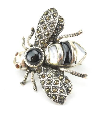 Sterling Marcasite Onyx Mother of Pearl Bee Brooch: Figural Sterling Silver Marcasite Onyx Mother of Pearl Bee Brooch. Measures 1 inch in length.