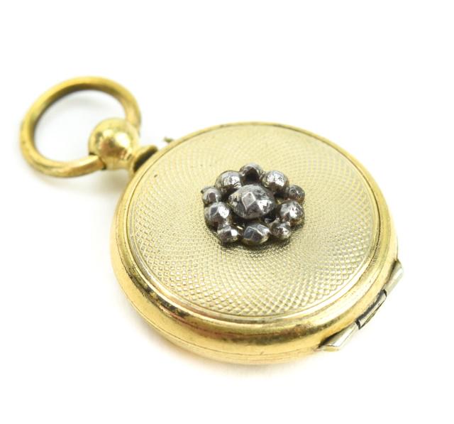 Antique 19th C Gold & Cut Steel Locket Pendant: Antique 19th C Gold & Cut Steel Locket Necklace Pendant. Front and back panels acid test as 10kt. Frame is gold filled or cased. Front set with cut steel. Measures 1.25 inches in length.