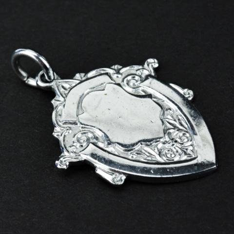 Antique English Style Armorial Crest Pendant: Antique English Style Armorial Crest Pendant Measures just over 1.5 inches in length.