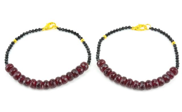 Pair of Faceted Ruby Bead Bracelets: Pair of Faceted Ruby Bead Bracelets Each bracelet with approximately 40 carats of faceted ruby beads. Each measures 8.25 inches in length. Beads may be treated or color enhanced.