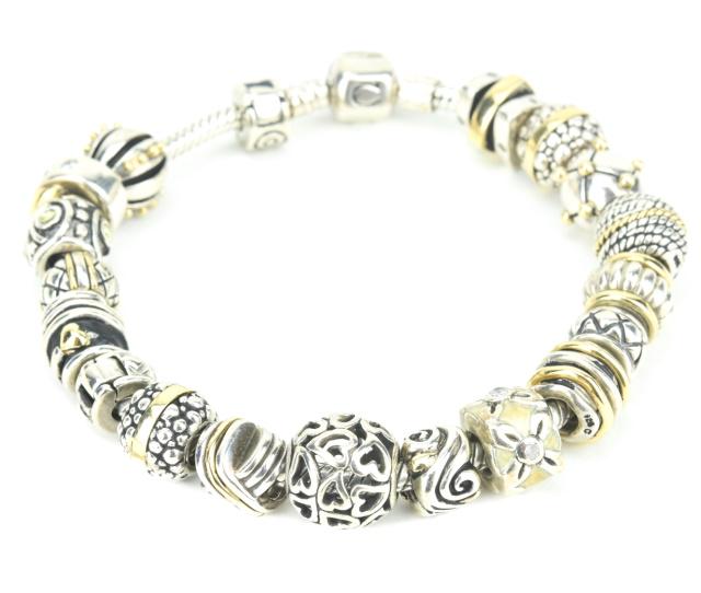 Sterling & 14K Gold Chamilia Charm Bracelet: Sterling & 14K Gold Chamilia Charm Bracelet. Measures 8 inches in length.