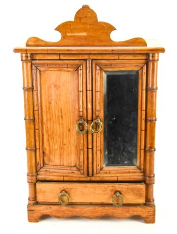 Antique 19th C French Faux Bamboo Doll Armoire: Antique 19th C French Faux Bamboo Doll Armoire Having original beveled glass mirror door and door and drawer hardware. Measures 22 by 14 by 7 inches.