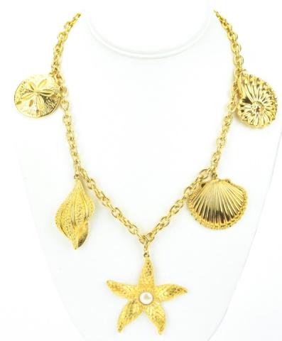 Vintage Kenneth J Lane Gilt Sea Shell Necklace: Vintage Kenneth J Lane Gilt Sea Shell Necklace. Signed. Vintage gilt metal costume jewelry necklace with sea shell design. Measures 20 inches in length plus pendant.