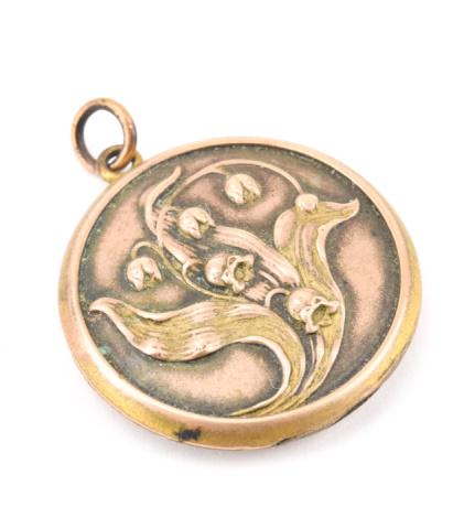 Antique C 1900 Art Nouveau Locket Necklace Pendant: Antique C 1900 Art Nouveau Locket Necklace Pendant. Floral lily of the valley repousse design modeled in gold filled. Measures nearly 1.5 inches in length.
