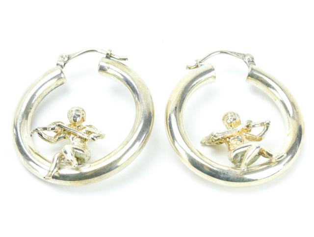 Pair Sterling Silver Cherub Hoop Earrings: Pair Sterling Silver Cherub Hoop Earrings. Measures just over 1.25 inches in length.