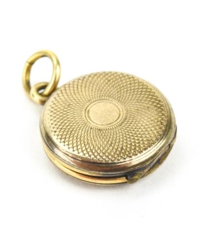 Antique 19th C Miniature Gold Filled Locket: Antique 19th Century Miniature Gold Filled Locket. Measures .5 of an inch.
