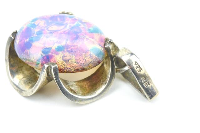 Sterling & Dragon's Breath Opal Necklace Pendant: Sterling Silver & Dragon's Breath Opal Necklace Pendant. Bail is hallmarked. Measures 1.75 inches in length.