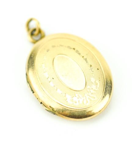 Antique Gold Filled Oval Form Locket Pendant: Antique Gold Filled Oval Form Locket Necklace Pendant. Measures just over 1 inch in length.