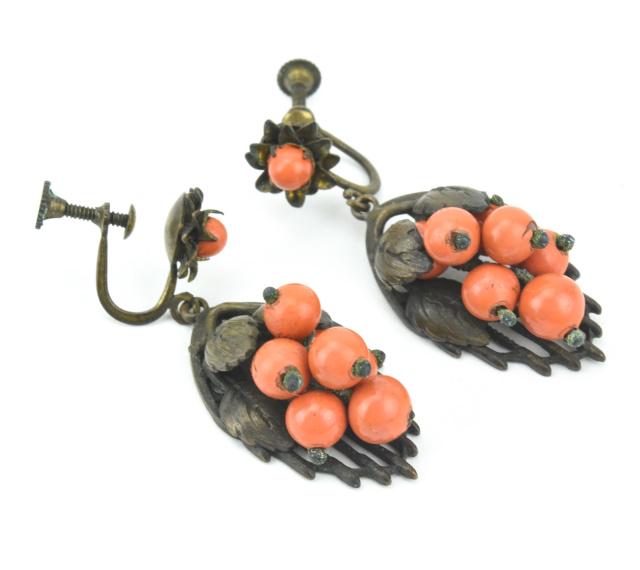 Antique Czech Style Faux Coral Art Glass Earrings: Pair of Antique Czech Style Faux Coral Art Glass Earrings. Grape cluster motif. Screw backs. Each measures 1.25 inches in length.