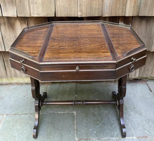 Duncan Phyfe Games Table with Brass Gallery: Duncan Phyfe Games Table with Brass Gallery. Table with lyre form base and Tiger Maple veneer top. Measures 30.5 inches x 31 inches x 21 inches.