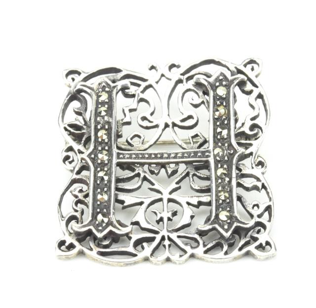 Sterling Silver & Marcasite H Letter Brooch: Sterling Silver & Marcasite H Letter Brooch. Measures just over 1.25 inches in length.