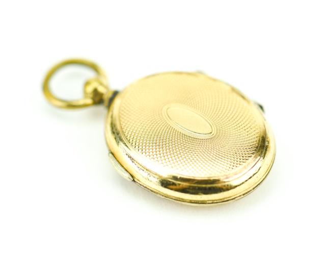 Antique 19th C 10kt Gold Locket Necklace Pendant: Antique 19th C 10kt Gold Locket Necklace Pendant. The front and back panels acid test as 10kt gold, the frame is gold filled / cased. Measures just over 1 inch in length.