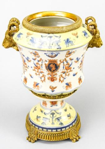 Porcelain & Ormolu Urn w Neoclassical Motifs: United Wilson Style Hand Painted Porcelain & Ormolu Urn with Neoclassical Motifs. Measures 13 inches x 11 inches.