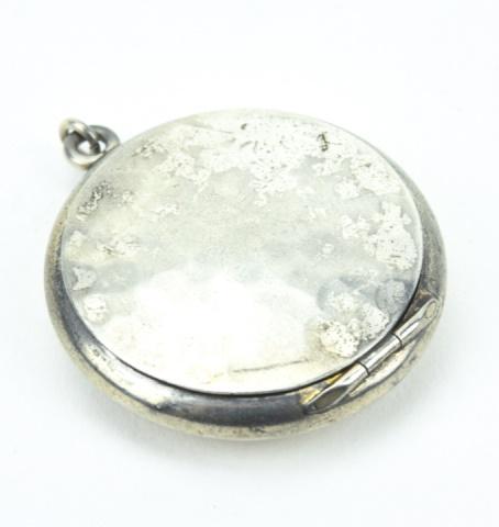 Antique Art Deco Sterling Silver Locket Pendant: Antique Art Deco Sterling Silver Locket Necklace Pendant. Measures 1.5 inches in length.