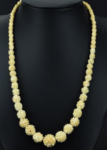 Antique Chinese Carved Bone Rose Motif Necklace: Antique Chinese Carved Bone Rose Motif Necklace. Graduated size hand carved bone beads. Measures 18 inches in length.