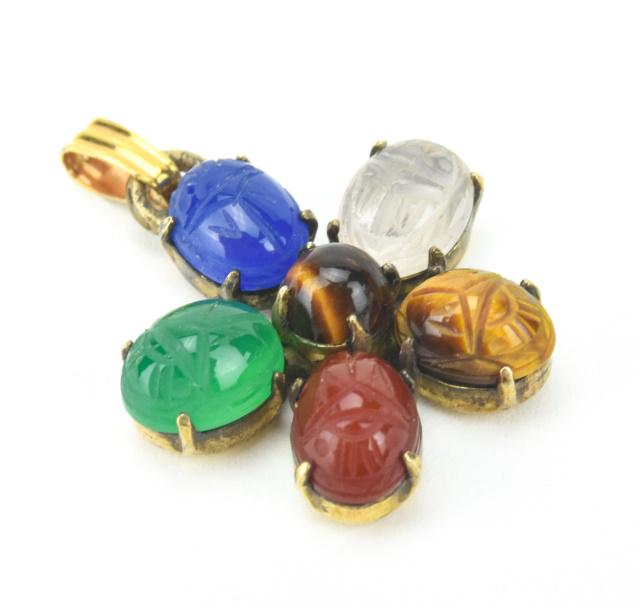 Estate Egyptian Revival Scarab Necklace Pendant: Estate Egyptian Revival Scarab Necklace Pendant. Set with tiger's eye, carnelian, quartz. Measures just over 1 inch in length.