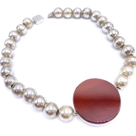Sterling and Carnelian Choker Necklace: Sterling and Carnelian Choker Necklace. Approximately 15.25 inches long and 72 grams inclusive.