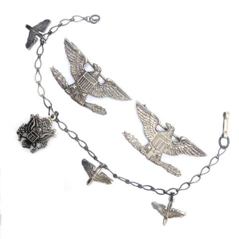 Vintage WW2 Sterling Medals & Charm Bracelet: Vintage WW2 Sterling Medals and Charm Bracelet – Fabulous eagle medals and unusual charm bracelet. For scale eagle pins are 1.5 inches wide.