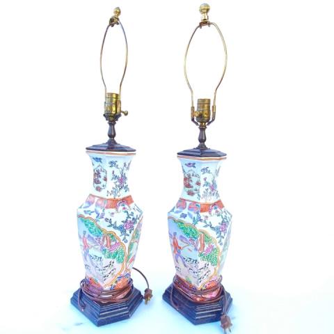 Pair of Chinese Porcelain Lamps: Pair of Chinese Porcelain Lamps. Antique or vintage. Measures approximately 26 inches to finial x 6 inches x 5 inches.