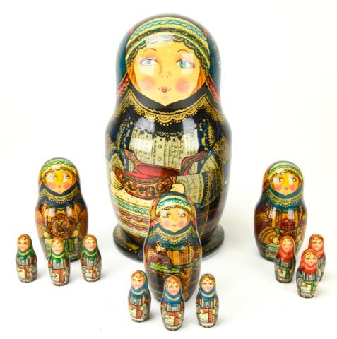 Hand Painted Russian Matryoshka Nesting Dolls: Hand Painted Russian Matryoshka Nesting Dolls. 13 pieces total. Largest measures 9.5 inches x 4.75 inches in diameter.