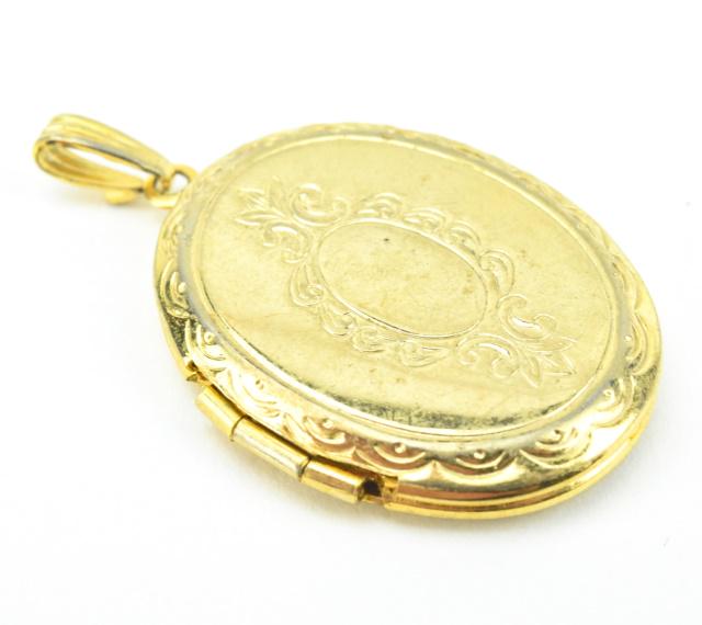 Estate Gold Filled Locket Necklace Pendant: Estate Gold Filled Locket Necklace Pendant. Measures 1.5 inches in length.