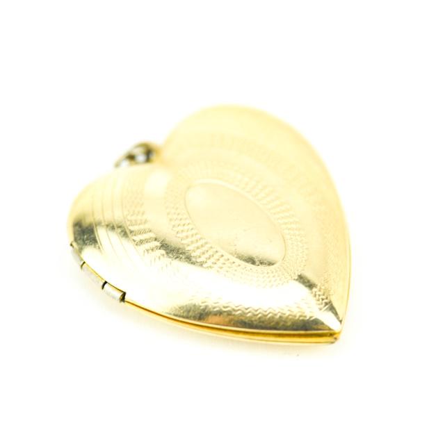 Estate Gold Filled Heart Form Locket Pendant: Estate Gold Filled Heart Form Locket Necklace Pendant. Measures just over 1.25 inches in length.