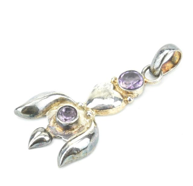 Sterling Silver & Amethyst Heart Motif Pendant: Sterling Silver & Amethyst Heart Motif Necklace Pendant. Hallmarked on bail. Measures nearly 2.25 inches in length.