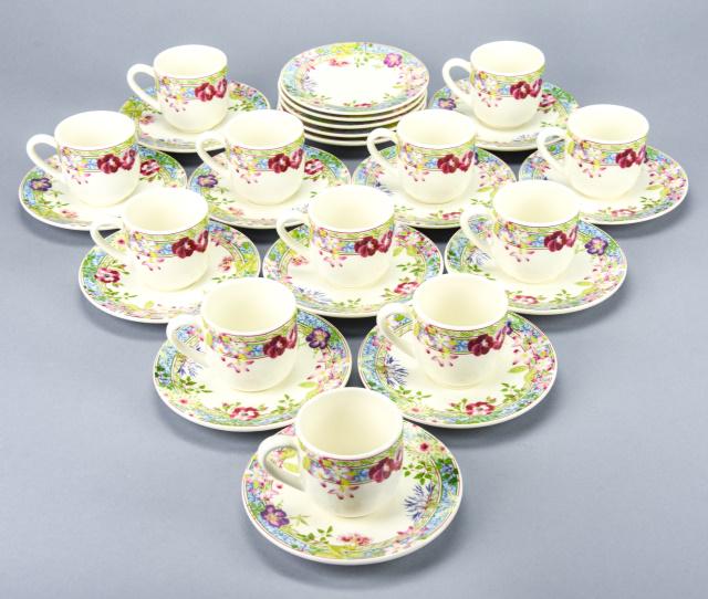 12 Gien France Millefleurs Porcelain Espresso Sets: 12 Gien France Millefleurs Porcelain Espresso Cups and Saucers. Measures 3 inches x 5 inches in diameter. Property of a designer decorated North Salem, New York equestrian estate.