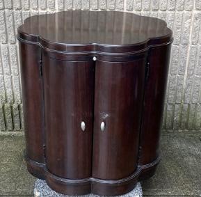 Mahogany Tone Round Scalloped Cabinet: Mahogany Tone Round Scalloped Cabinet. Measures 28 inches 28 inches.