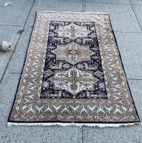 Turkish Hand Knotted Area Rug w Medallion Motif: Turkish Hand Knotted Area Rug with Medallion Motif. Having navy, tan, and ivory colorways. Measures 78 inches x 48 inches.
