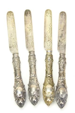 Antique Martin Hall & Co Sheffield Sterling Knives: Set 4 Antique Martin Hall & Co Sheffield Sterling Knives. Knives with chased blade and baroque motifs. Hallmarked on blade "RM EH". Circa 1863. Weighs approximately 221 grams. Measures 8.75 inches in 