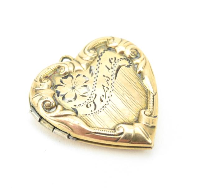 Antique Gold Filled Heart Form Locket Pendant: Antique Gold Filled Heart Form Locket Necklace Pendant. Measures just under 1 inch in length.