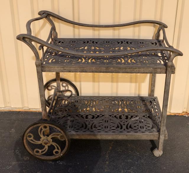 Cast Aluminum Outdoor Rolling Bar Cart: Cast Aluminum Outdoor Rolling Bar Cart. Measures 34 inches x 36 inches x 22.5 inches.
