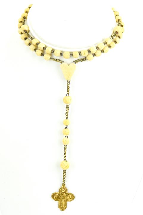 Antique Carved Bone & Gilt Metal Rosary Bead Set: Antique Carved Bone & Gilt Metal Rosary Bead Set. Measures 24 inches in length, plus extender with cross.