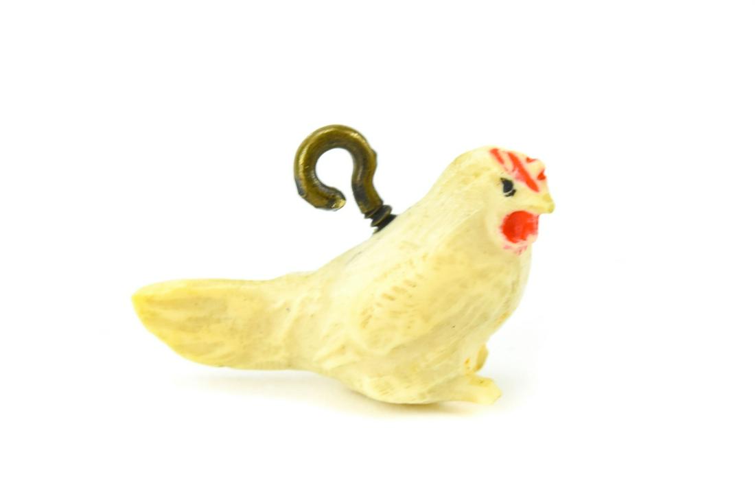 Antique Hand Carved Bone Rooster Pendant or Charm: Antique Hand Carved Bone Rooster Pendant or Charm. Measures nearly .75 of an inch in length.