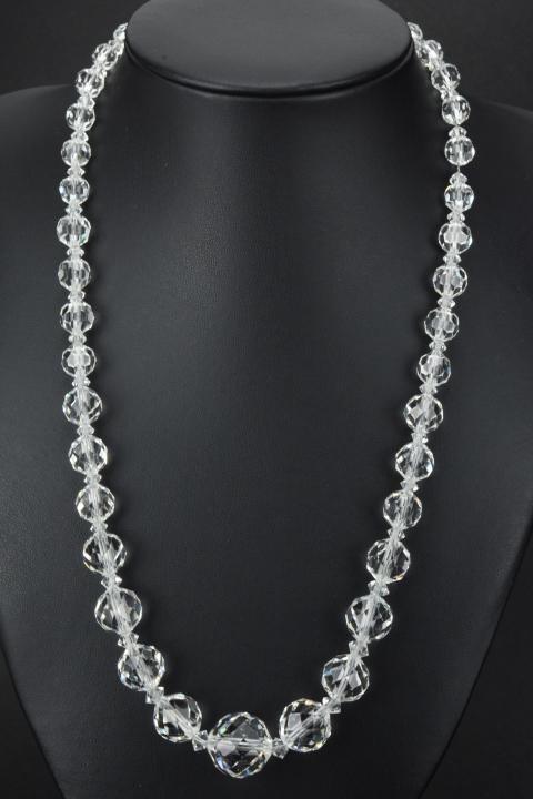 Antique Art Deco Flapper Era Rock Crystal Necklace: Antique Art Deco Flapper Era Rock Crystal Necklace. Graduated size beads that are strung on silver chain. Measures 19 inches in length.