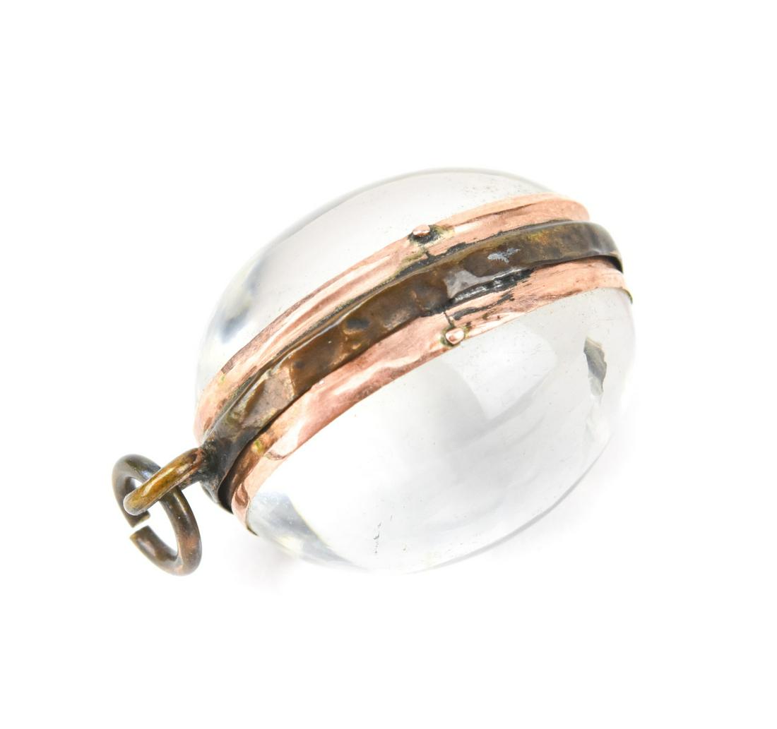 Antique Rock Crystal Cabochon Magnifying Locket: Antique 19th C Rock Crystal Cabochon Magnifying Locket Necklace Pendant. Having two oval cabochon cut rock crystal panels, minimal natural veining / inclusion on one side set in gold filled or gilt se