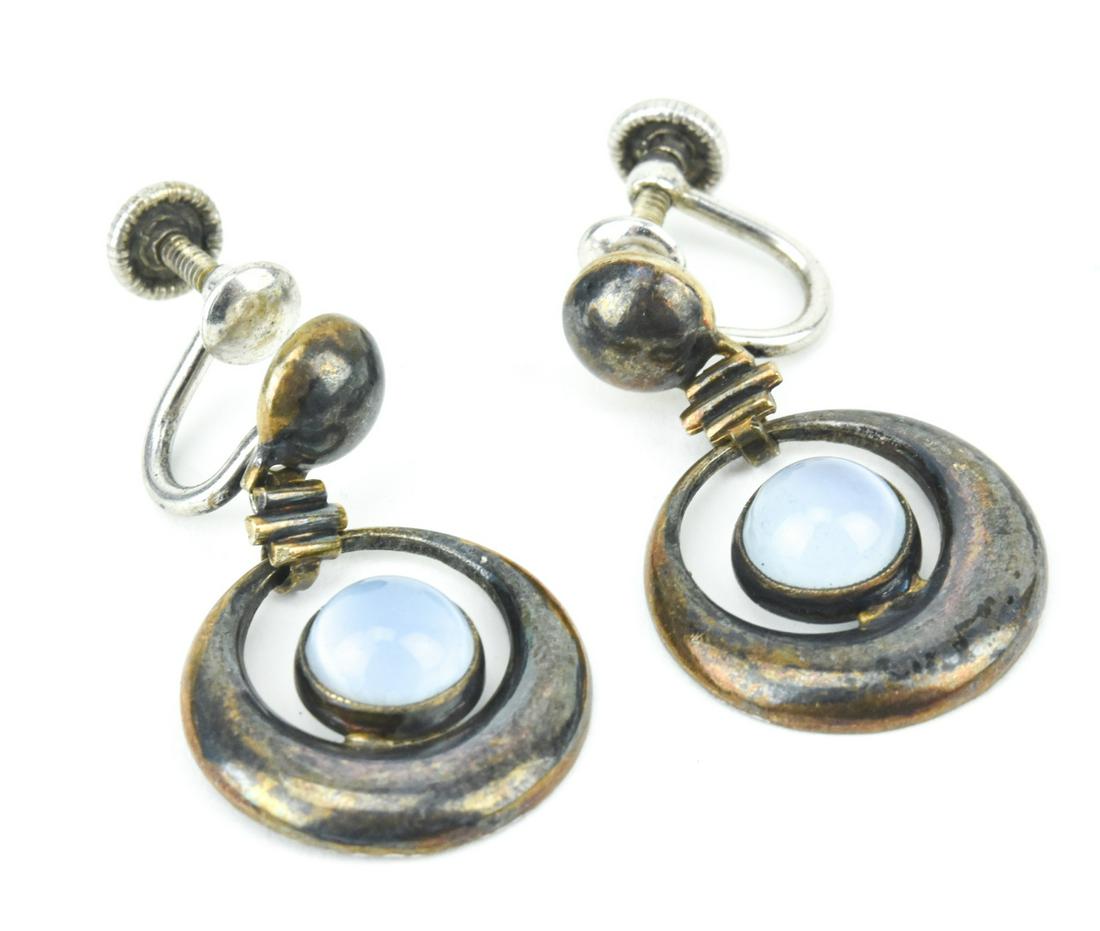 Antique Sterling & Moonstone Glass Pendant Earring: Pair of Antique Sterling & Moonstone Glass Pendant Earrings. Screw backs. Each measures just over 1 inch in length.
